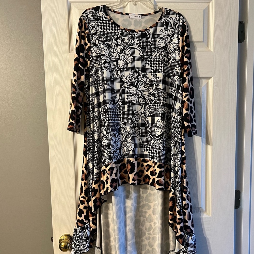 Euc Nuggles high low top. Multi print. Size XL